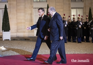 President Emmanuel Macron welcomes Mawlana Hazar Imam to the Palais de l'Élysée for a dinner reception ahead of the Paris Peace Forum.