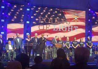 Five former Presidents on stage for the Points of Light Award ceremony, with the five awardees and Neil Bush