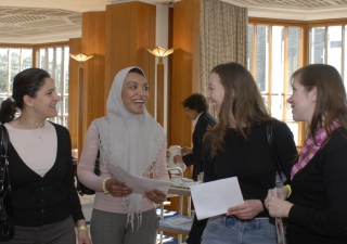 Women of diverse backgrounds exchange stories and ideas at the International Women’s Day event held at the Ismaili Centre, London.