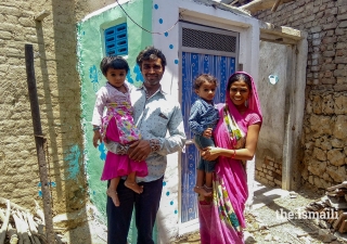 a_family_of_four_with_their_new_toilet._the_introduction_of_toilets_has_made_a_substantial_difference_to_community_health_outcomes_in_areas_where_akahi_has_implemented_its_environmental_health_improvement_programme