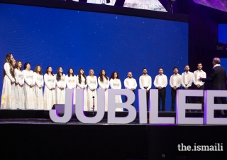 Syrian voices end the night with a choral performance.