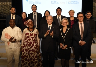 Mawlana Hazar Imam and Chief Justice Beverly Mclaughlin join the inaugural Global Pluralism Award recipients for a group photograph.
