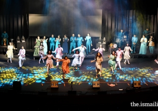 The entire troupe of dancers from Stories perform a swing routine to the sounds of live vocalists and instrumentalists as part of the show finale.