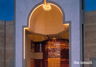 The principal entrance of the Ismaili Centre, Vancouver, takes the form of a niche, emanating a lamp-like light.