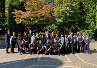 Members of local law enforcement agencies in the courtyard of the Ismaili Centre, Burnaby.