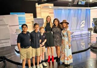 Charlie Philps, Zayden Lalani, and Luke Stoeehlein at KPRC News studio with anchors.