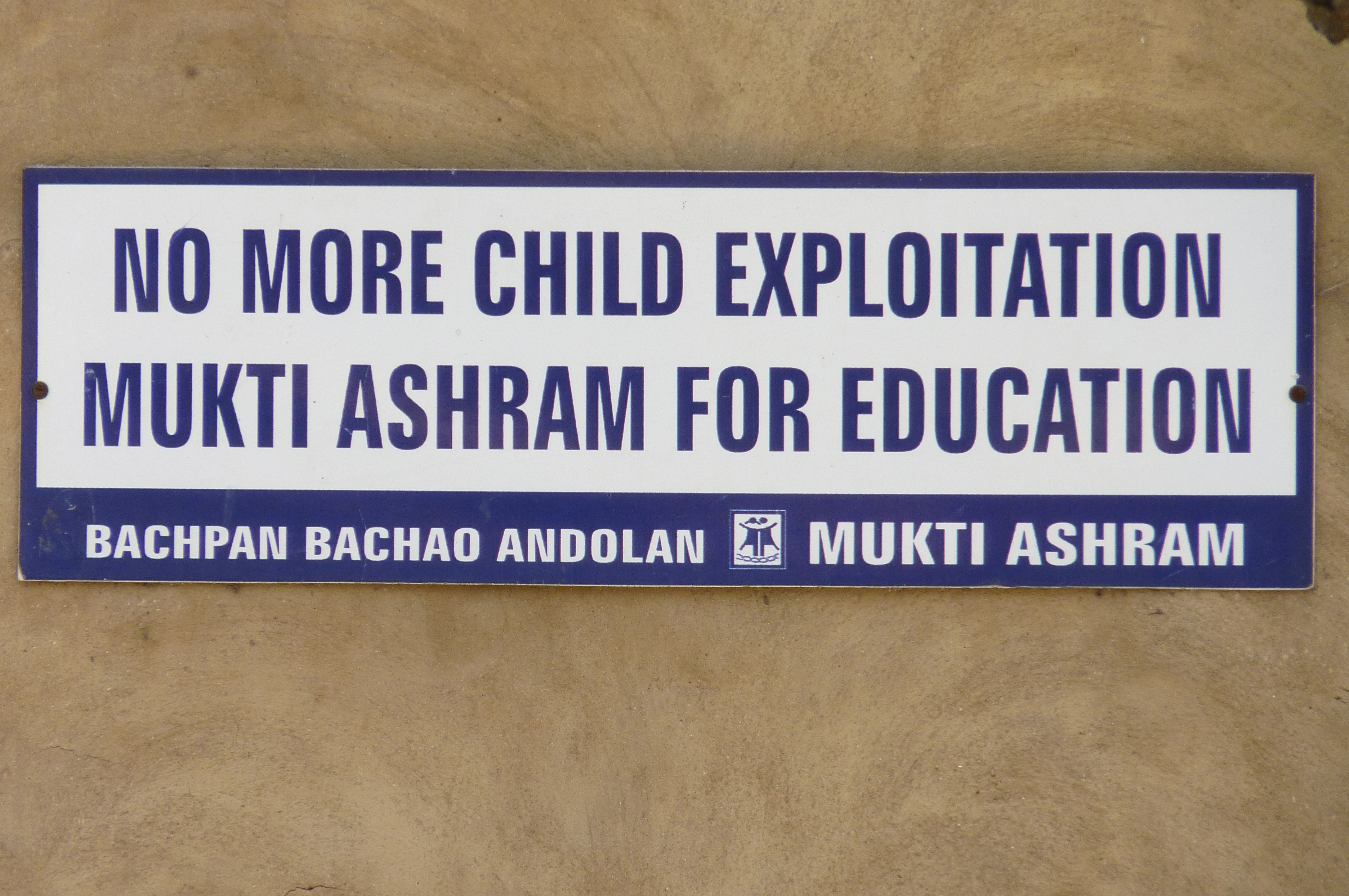 A sign posted at an Ashram run by an Indian NGO that helps child labourers decries child exploitation. Photo: Courtesy of Linx Productions