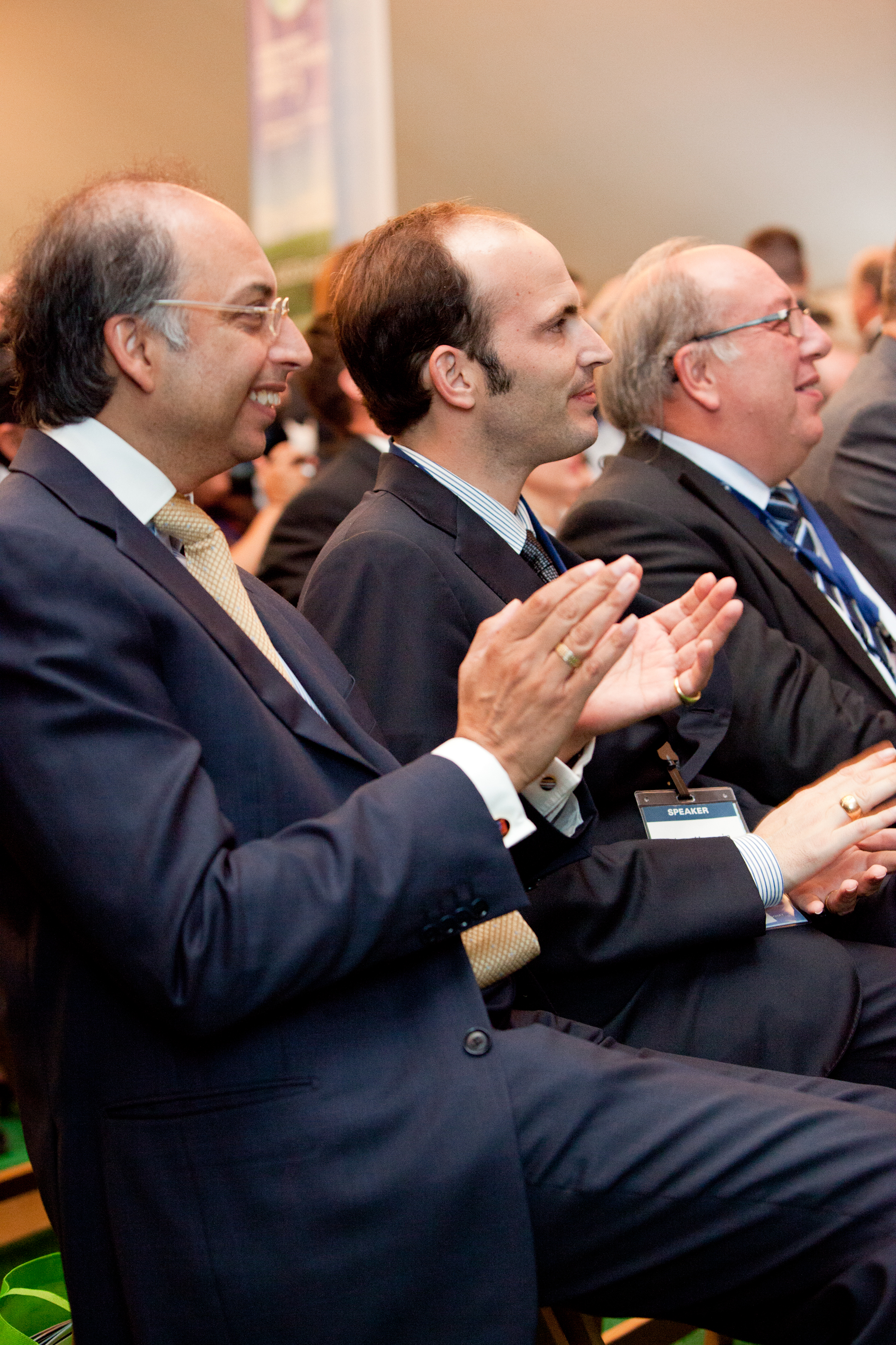 Prince Hussain and Ismaili Council President Mahmoud Eboo applaud during a presentation at the Governors’ Global Climate Summit 3 plenary session. Photo: Farhez Rayani