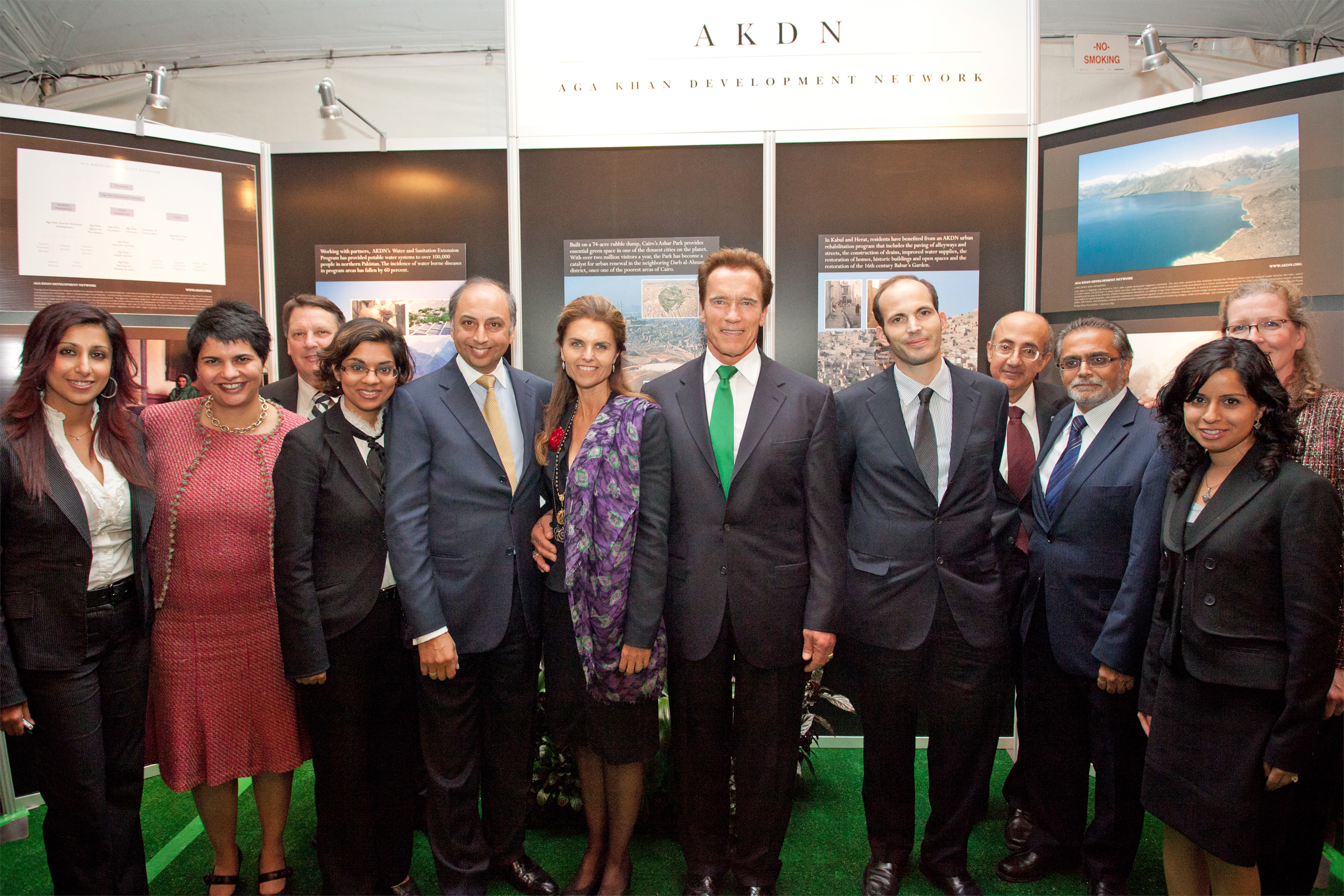 Jamati volunteers and representatives from AKF USA and FOCUS North America gather with Prince Hussain, Governor Schwarzenegger and his wife in front of the AKDN information booth at the Governors’ Global Climate Summit 3, which was hosted at the University of California at Davis. Photo: Farhez Rayani