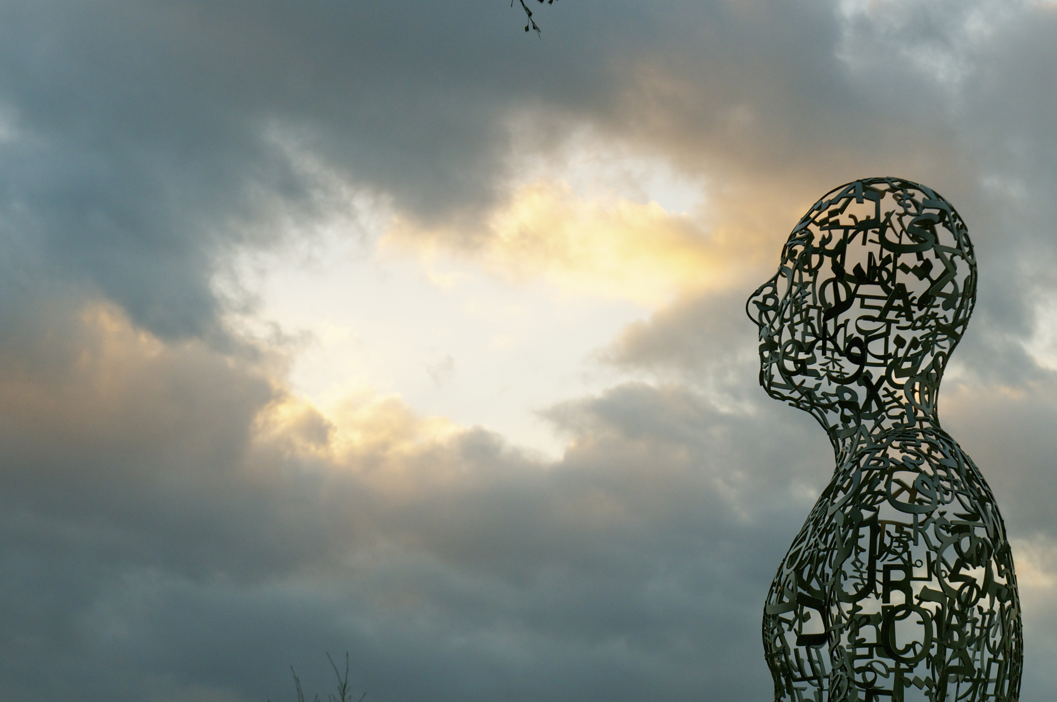 Silhouette of one of the Tolerance figures against the Houston sky moments before sunset. Photo: Zahid Alibhai