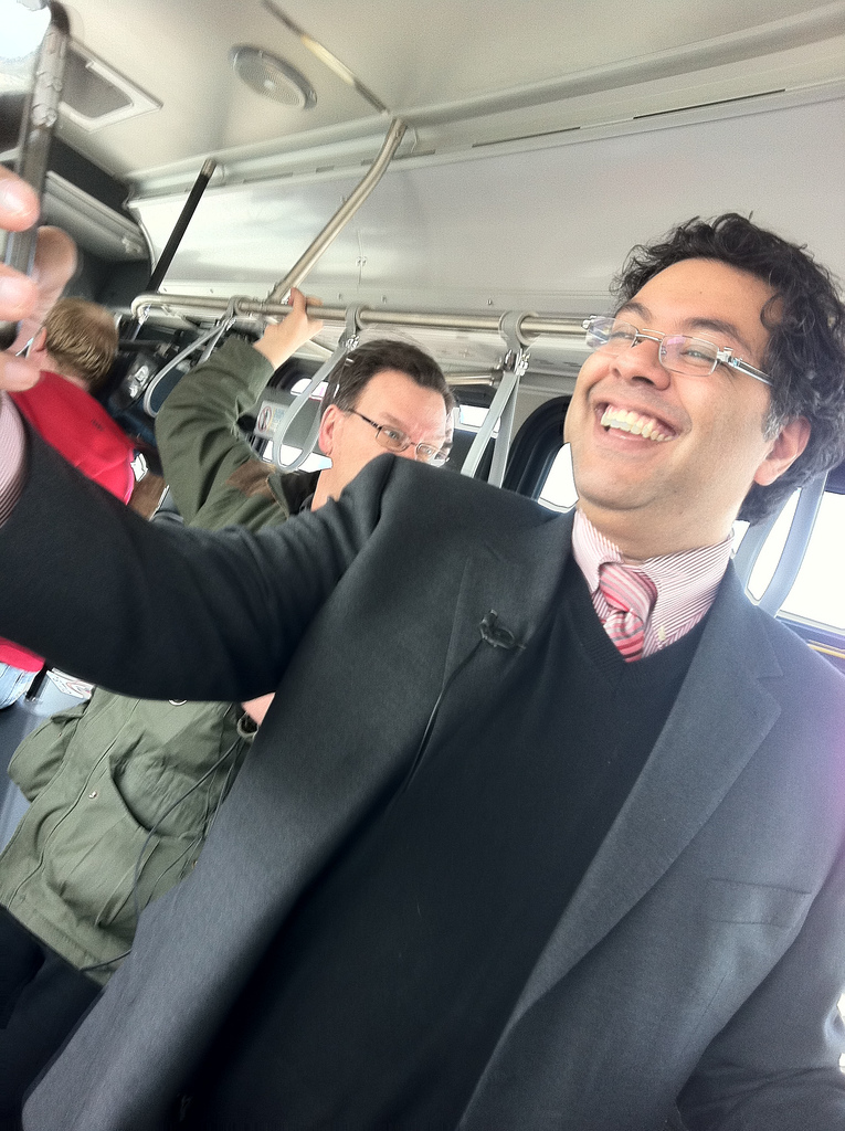 Mayor Naheed Nenshi rides the new Route 100 bus that connects downtown Calgary directly to the airport.  . Photo: Courtesy of Mayor Nenshi and Team